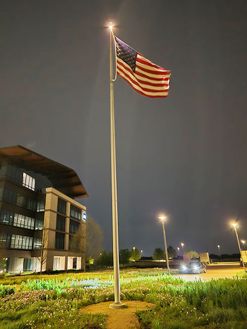 A flagpole light system installed at a Plano, Texas business.